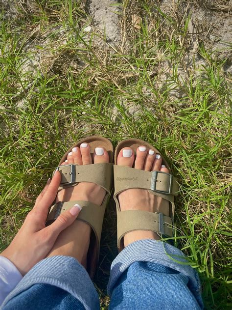 white toes in birkenstocks.